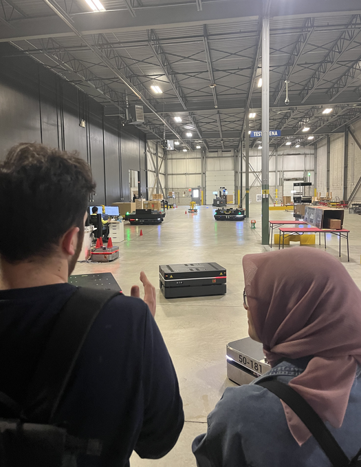 Clearpath engineer and grad student have a discussion